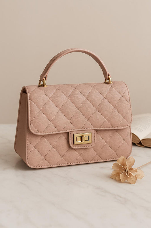 Sac à main matelassé en cuire rose poudré